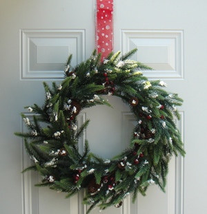 Wreath hung high with Wreath Pro adjustable wreath hanger.